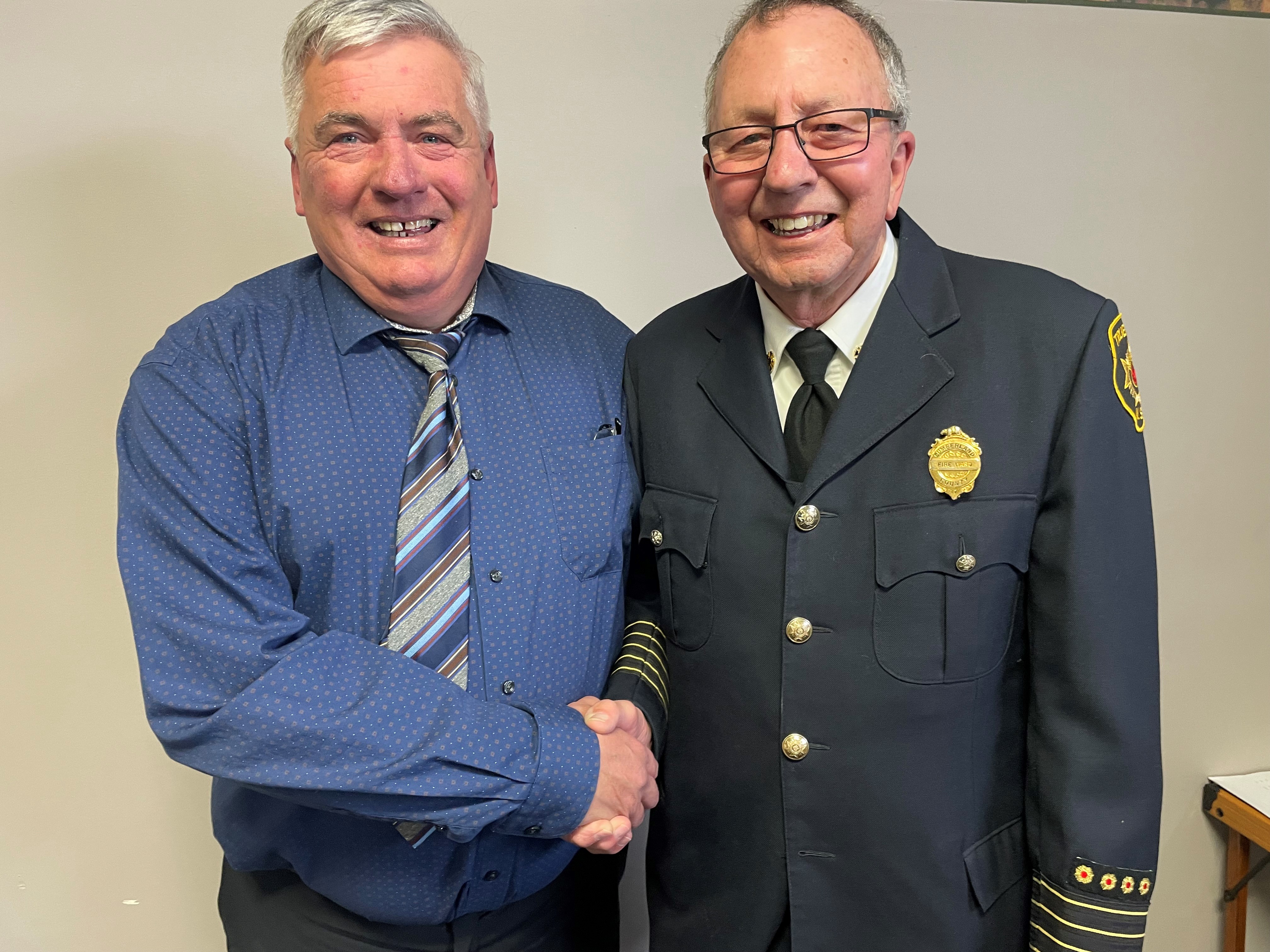 Truemanville Fire Department fire chief Lyman Bacon is honoured on his retirement during a ceremony Feb. 17.