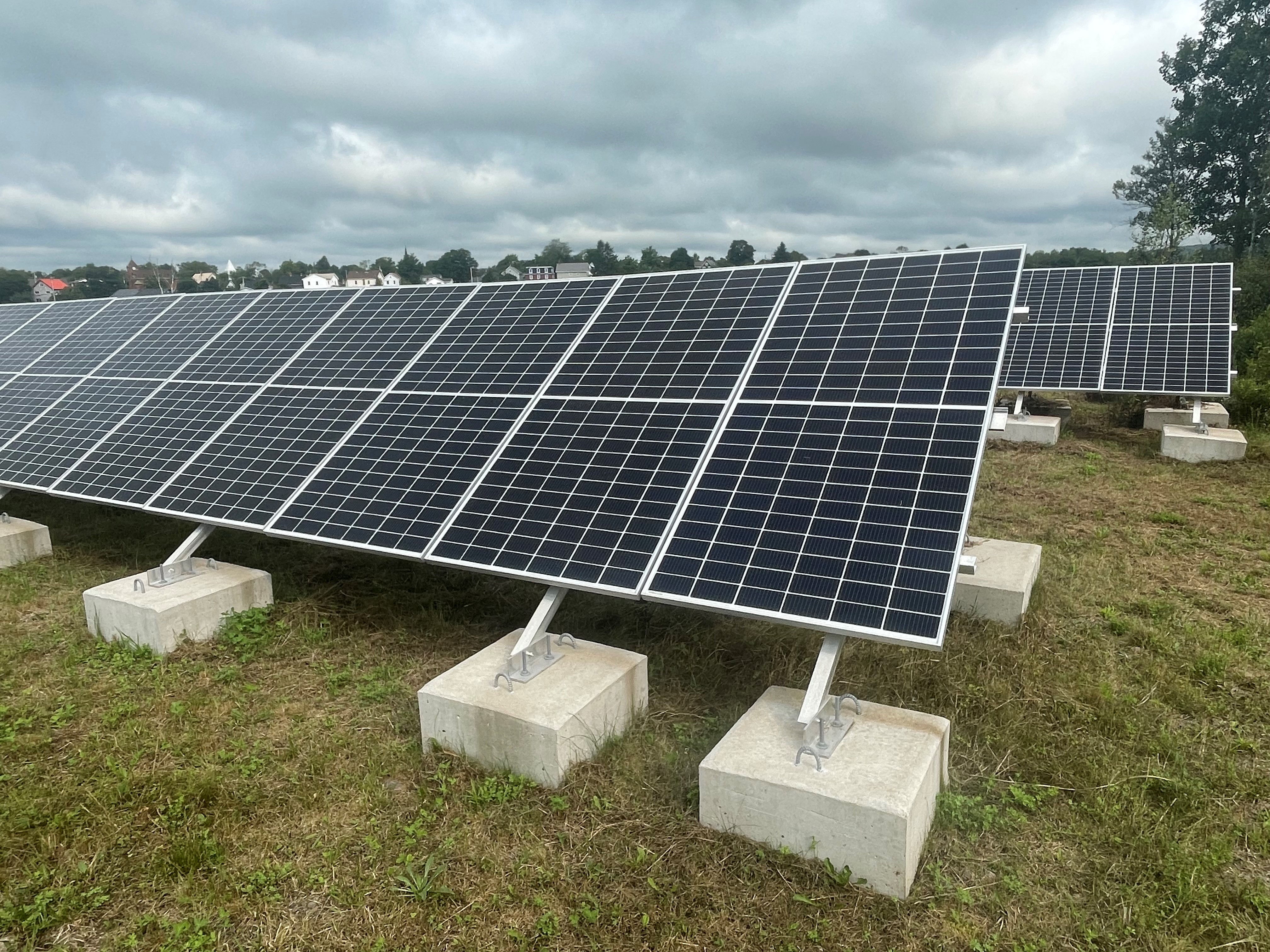 Solar panels sit on the ground in Parrsboro.