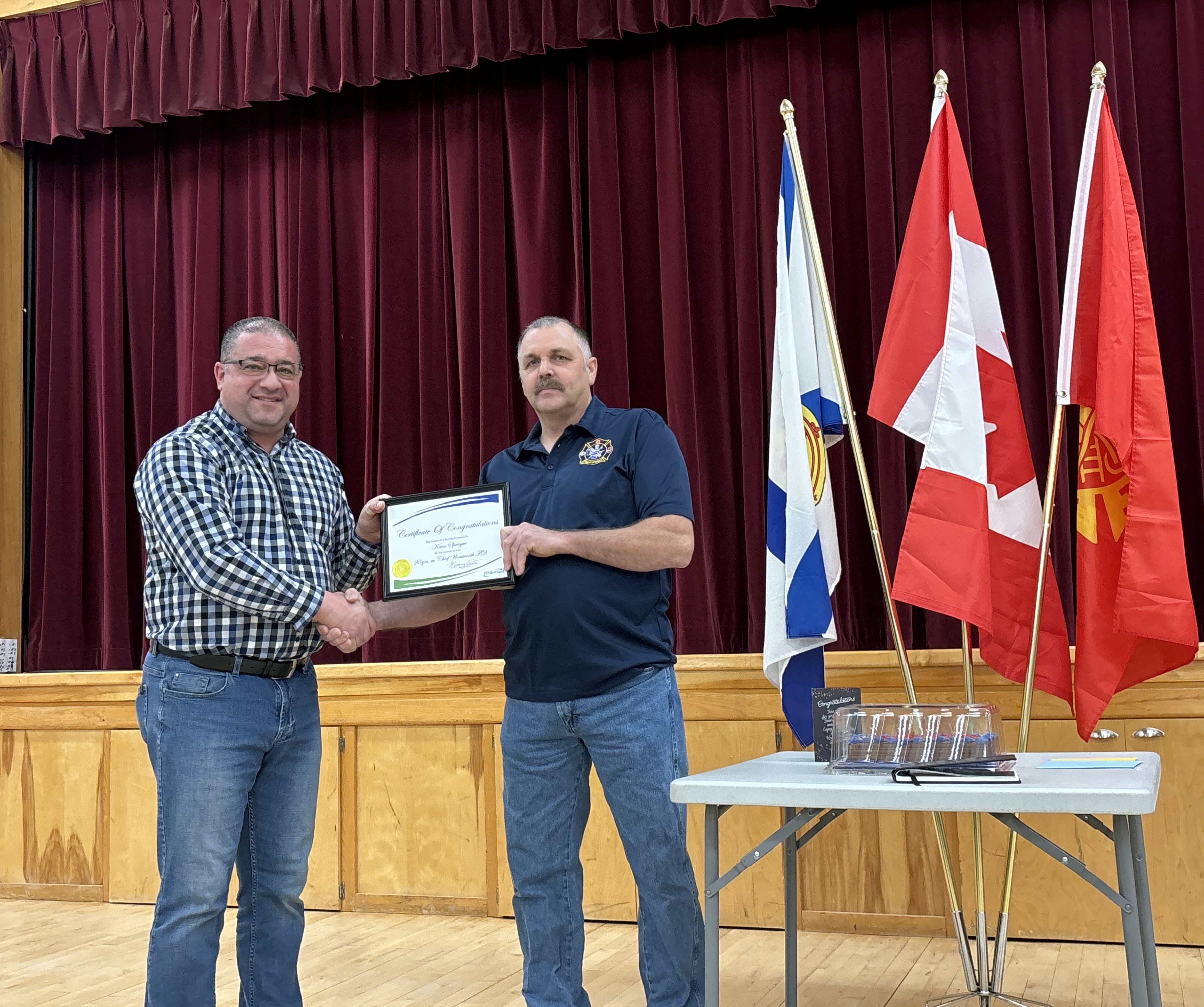 District 6 Coun. Mark Joseph thanks retiring Wentworth fire chief Kevin Sprague.